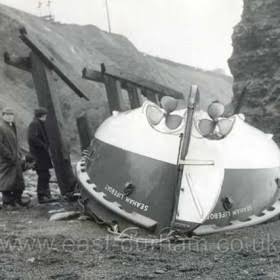 The capsized George Elmy lifeboat ashore after the disaster